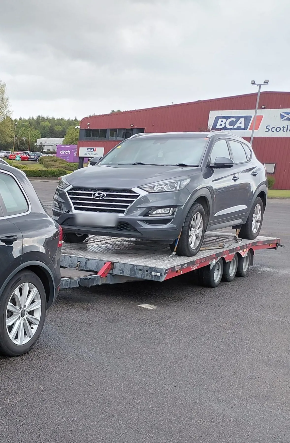 Hyundai SUV loaded on the trailer outside BCA auction house